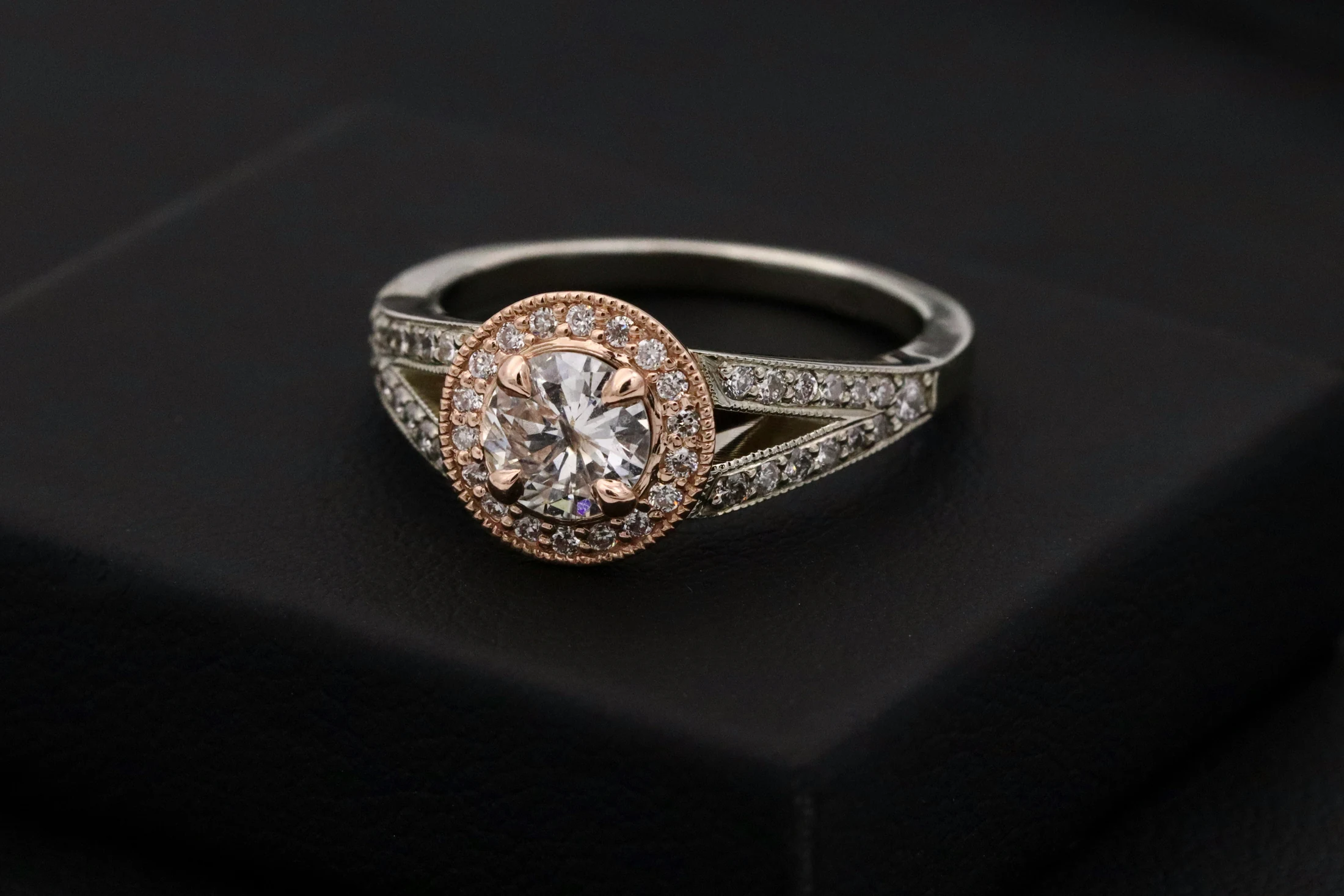 Diamond ring on dark velvet
